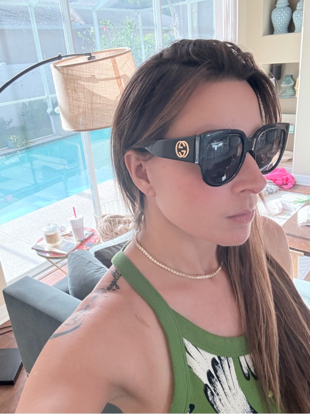 Gucci Black Sunglasses with Gold Logo Accent